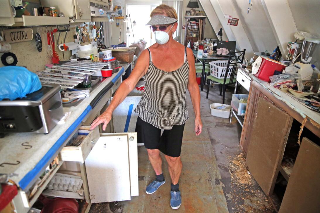 Dee Thorne walks through her home on Big Pine Key in the Florida Keys, d...