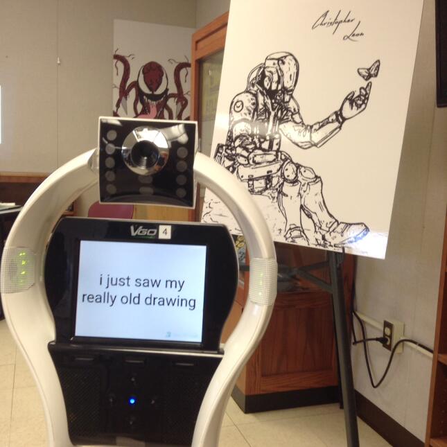 El robot VGo usado por Christopher León y uno de sus dibujos